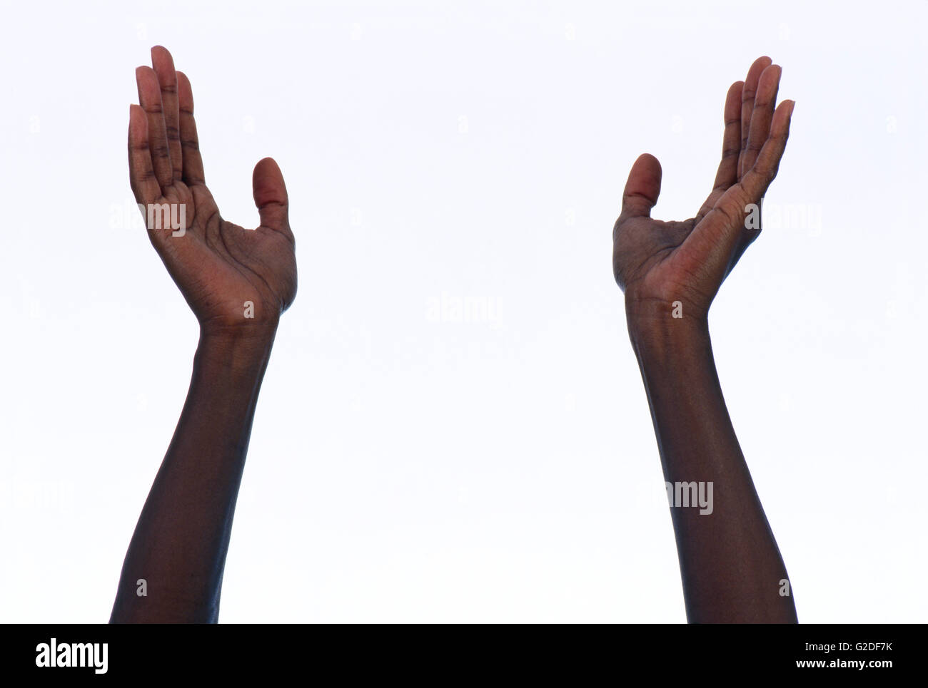 Upraised Arms and Hands Stock Photo