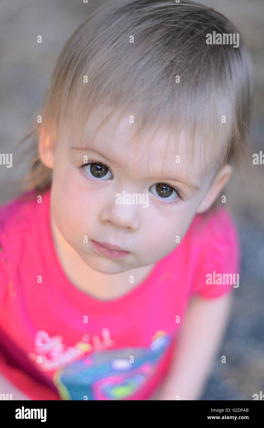 Portrait of Young Girl Looking Up Stock Photo - Alamy