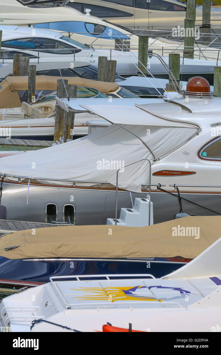 detail image of a line of boats at a marina, lined up in Sag Harbor, NY Stock Photo