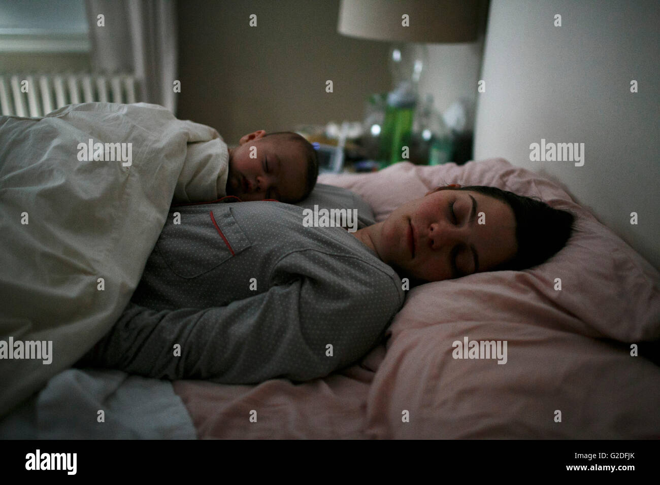 Mother and Newborn Baby Sleeping in Bed Stock Photo Alamy