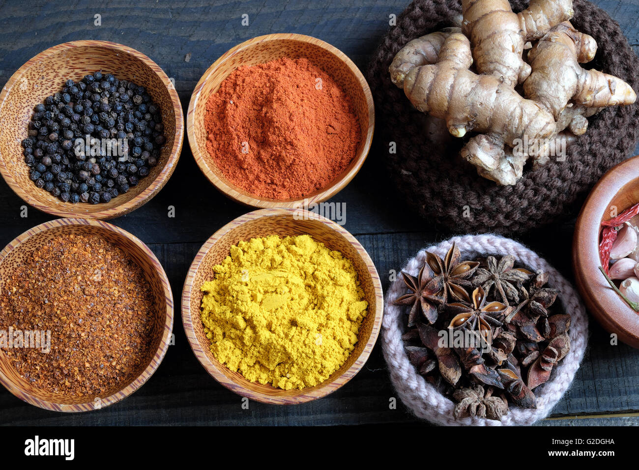 Colorful spice for food, with natural color and make aromatic flavor, cashew, chilli, pepper, turmeric powder, star anise Stock Photo