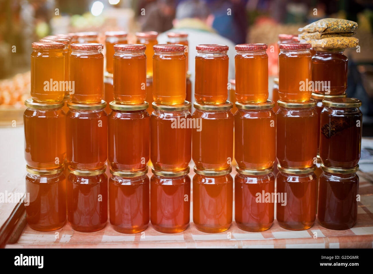 Glass honey jars Stock Photo - Alamy