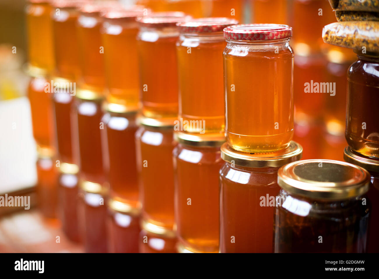 Glass honey jars Stock Photo Alamy