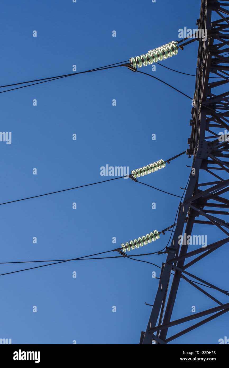 electric insulator on the background of blue sky Stock Photo