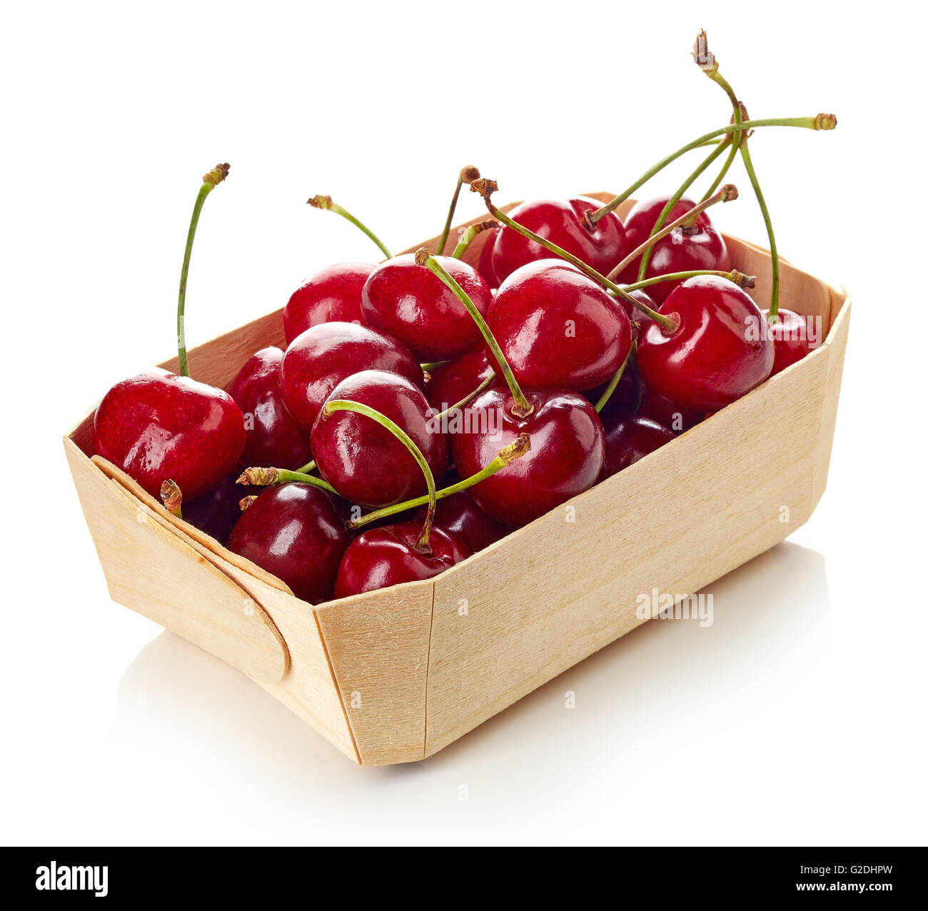 cherry in wooden container box, isolated on white background Stock Photo