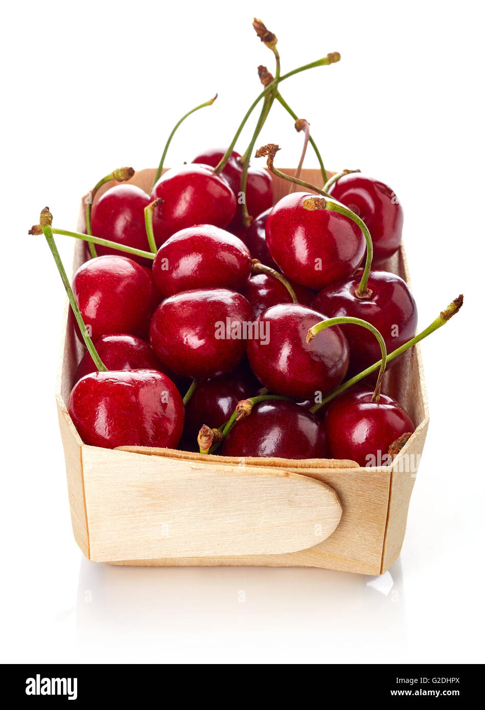 cherry in wooden container box, isolated on white background Stock Photo