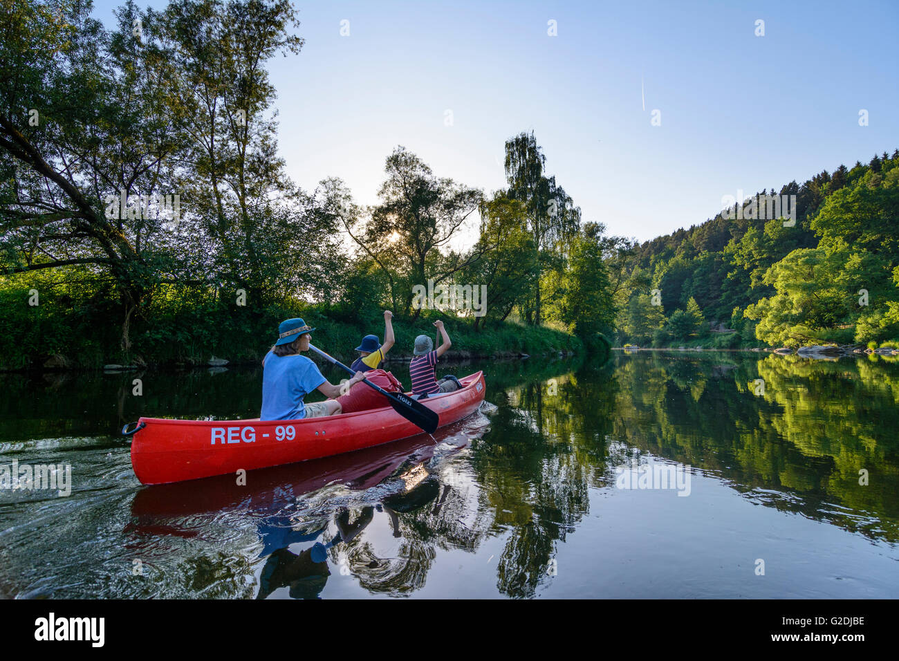 Paddlers in canoes ( Canadians ) on the river Regen, Bavaria, Germany Stock Photo
