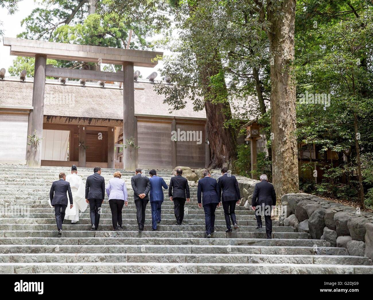 World leaders at the G7 Summit meeting walk up the steps to enter the Mikakiuchi at the Shogu of the Ise-Jingu Shrine May 26, 2016 in Ise, Mie Prefecture, Japan. Stock Photo
