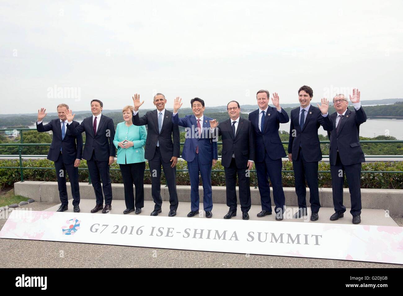 World leaders at the G7 Summit meeting wave during for a group photo on the roof garden of the Shima Kanko Hotel May 26, 2016 in Shima, Mie Prefecture, Japan. Left to Right: European Council President Donald Tusk, Italian Prime Minister Matteo Renzi, German Chancellor Angela Merkel, U.S President Barack Obama, Japanese Prime Minister Shinzo Abe, French President Francois Hollande, British Prime Minister David Cameron, Canadian Prime Minister Justin Trudeau, and European Commission President Jean-Claude Juncker. Stock Photo