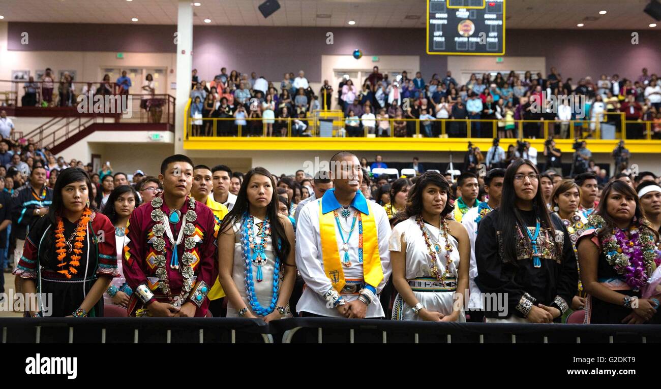 Graduating students listen to U.S First Lady Michelle Obama give the commencement address at the Santa Fe Indian School high school graduation ceremony May 26, 2016 in Santa Fe, New Mexico. Stock Photo