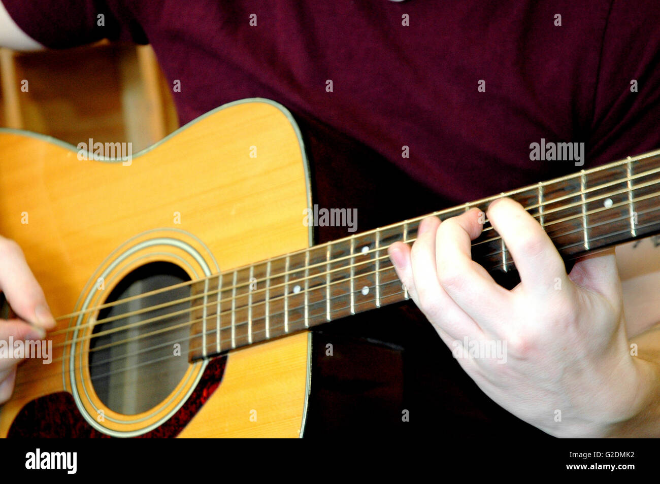 Guitarist performing a solo Stock Photo - Alamy