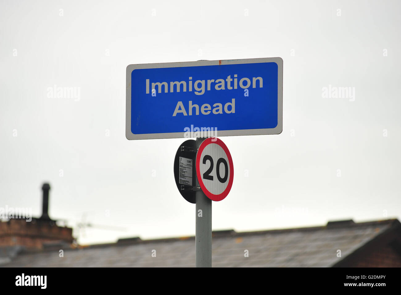 Immigration Ahead on a sign in Bristol in the UK Stock Photo - Alamy