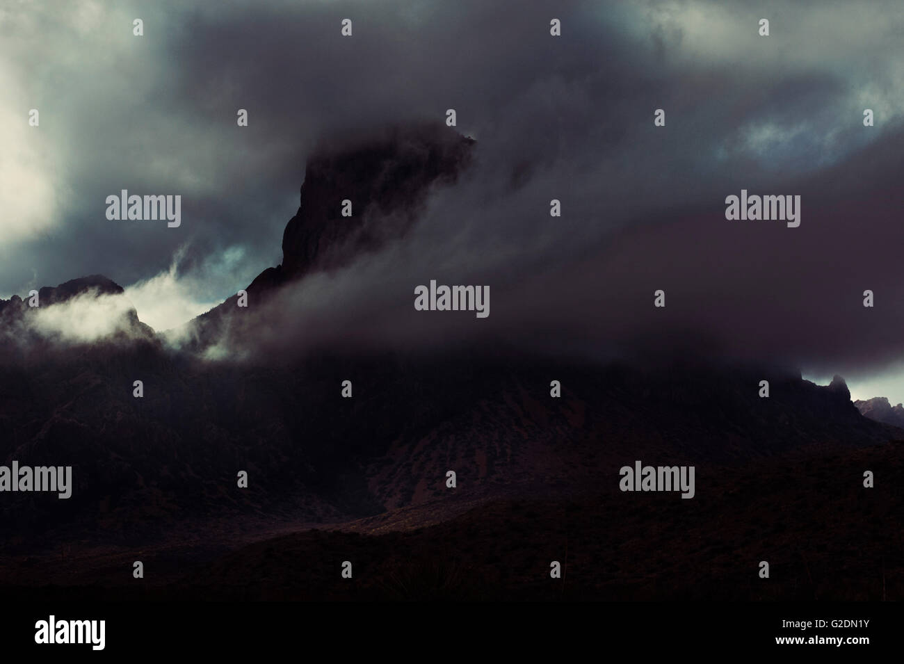Mountain Obscured by Ominous Cloud Stock Photo