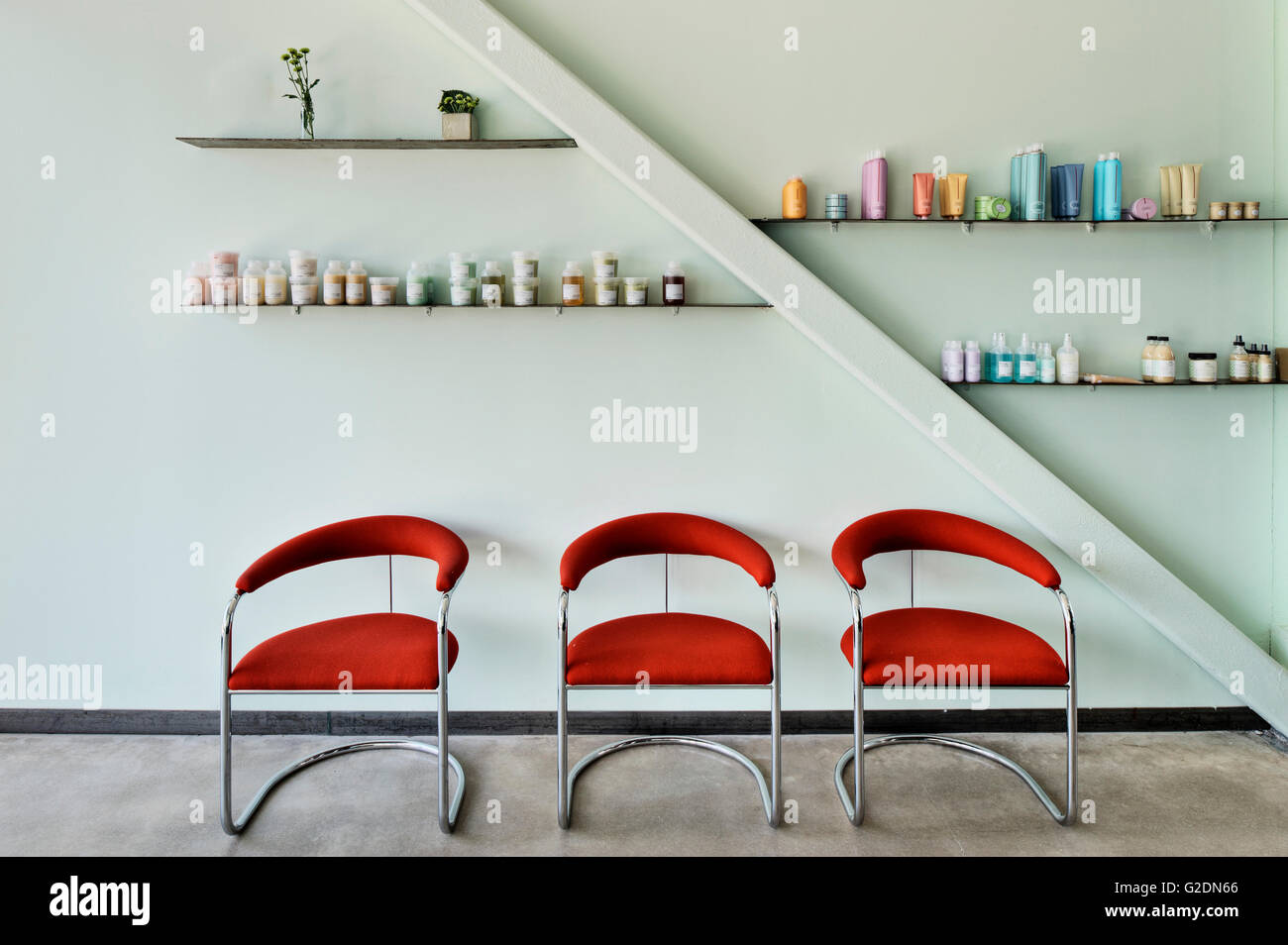 Three Red Chairs in Hair Salon Stock Photo