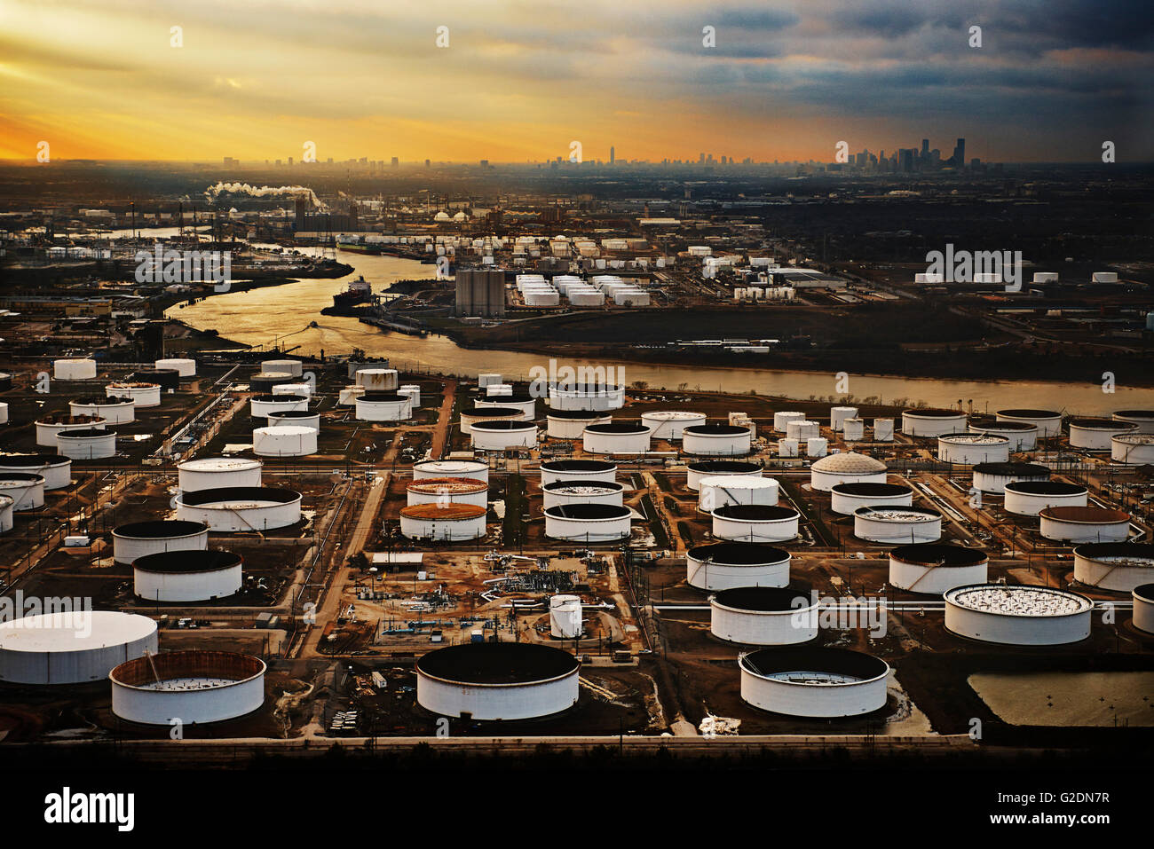 Storage Tanks at Oil Refinery with Houston Texas, USA Skyline in