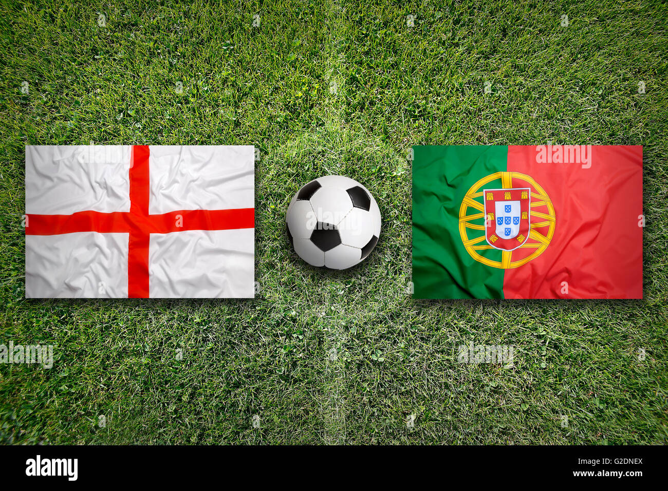 England vs. Portugal flags on a green soccer field Stock Photo Alamy