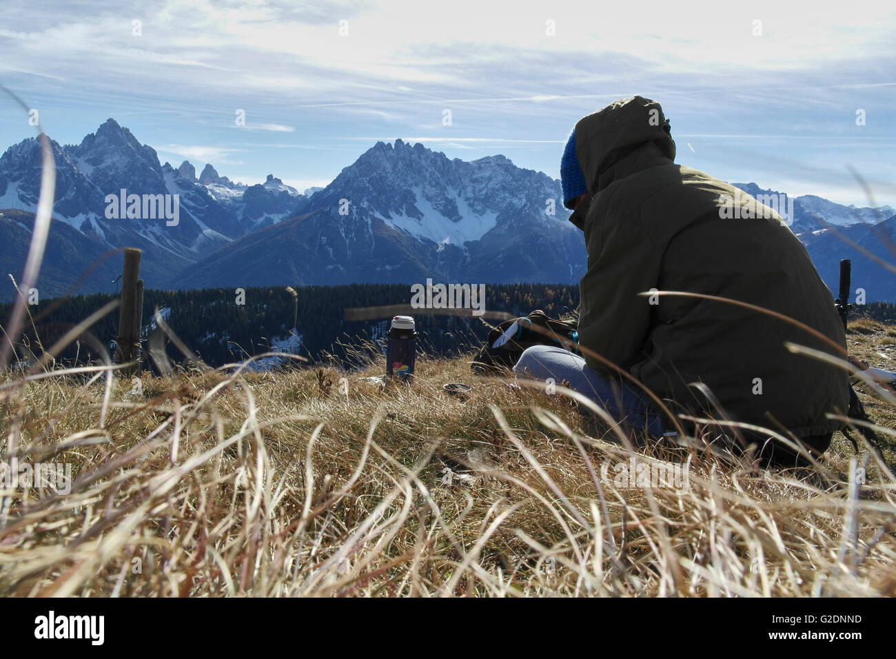 Man standing in front of the Sextner Dolomiten - Italy Stock Photo