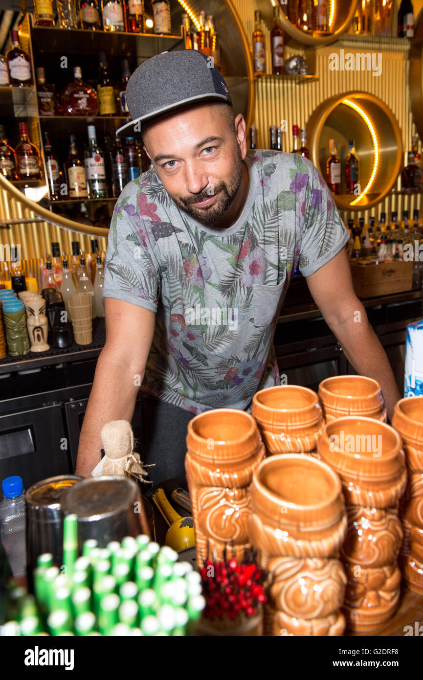 Nicolas Saint-Jean the worlds leading 'Flair' bartender puts on a show of  his skills.Rum festival Maholo Wan Chai Stock Photo - Alamy