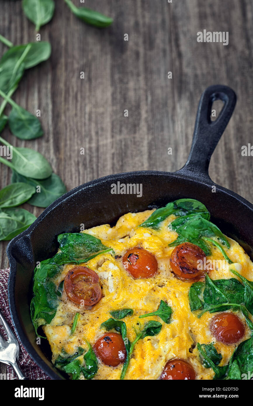Spinach frittata in iron skillet Stock Photo Alamy