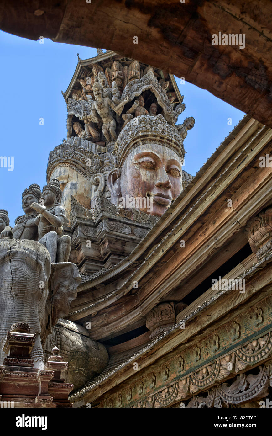 Rooftop wooden carving at the Sanctuary of truth Buddhist Hindu temple. Pattaya Thailand S. E. Asia Stock Photo