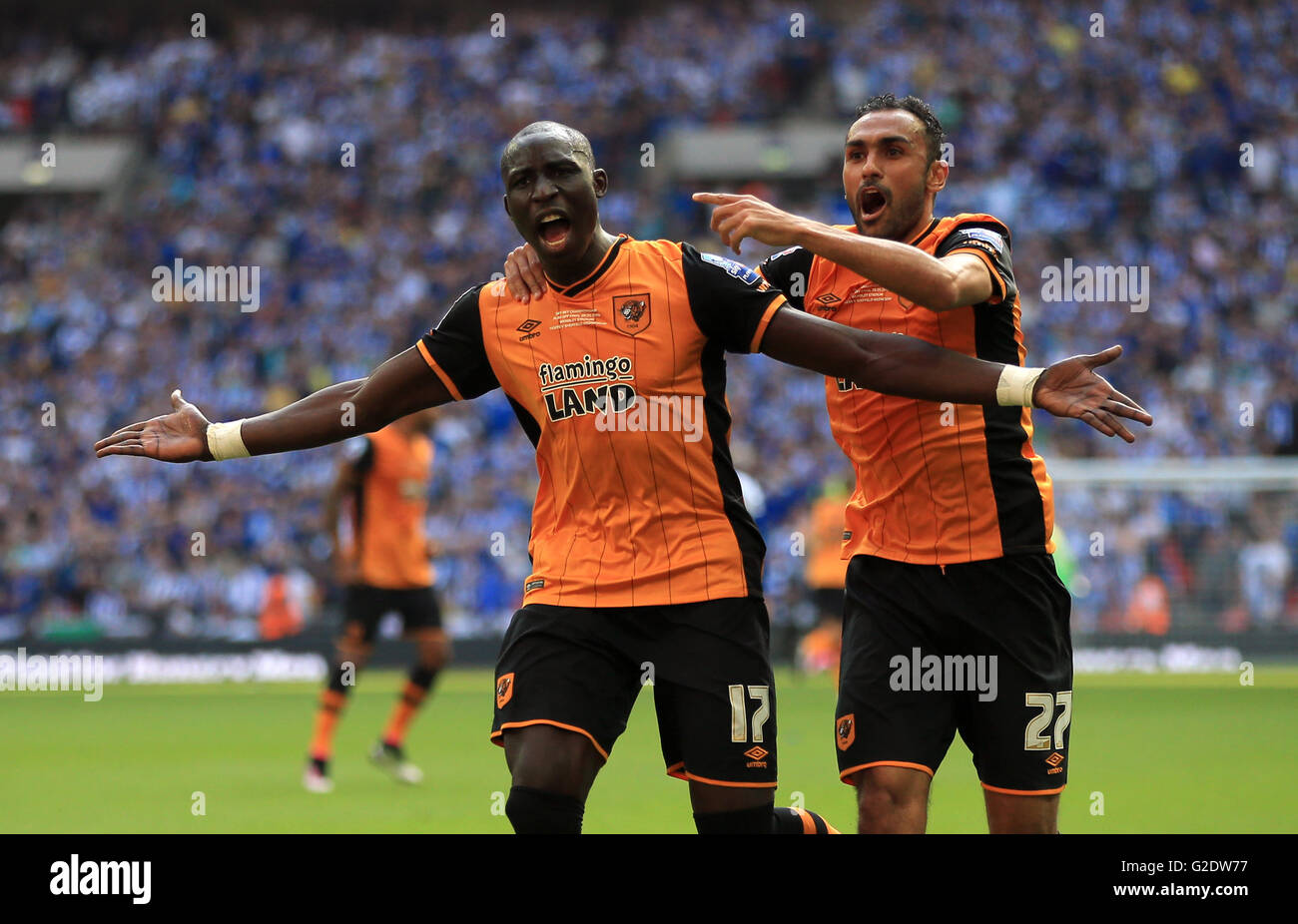 Hull City's Mohamed Diame celebrates scoring his side's first goal of the game with Ahmed Elmohamady (right) during the Championship Play-Off Final at Wembley Stadium, London. PRESS ASSOCIATION Photo. Picture date: Saturday May 28, 2016. See PA story SOCCER Championship. Photo credit should read: Nick Potts/PA Wire. RESTRICTIONS: No use with unauthorised audio, video, data, fixture lists, club/league logos or 'live' services. Online in-match use limited to 75 images, no video emulation. No use in betting, games or single club/league/player publications. Stock Photo