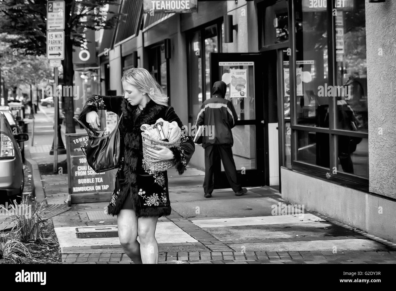 Exiting woman walking sidewalk hi-res stock photography and images - Alamy