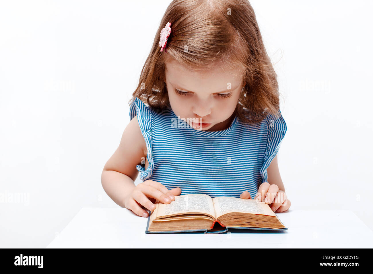 little girl reading book. isolated on white background Stock Photo - Alamy