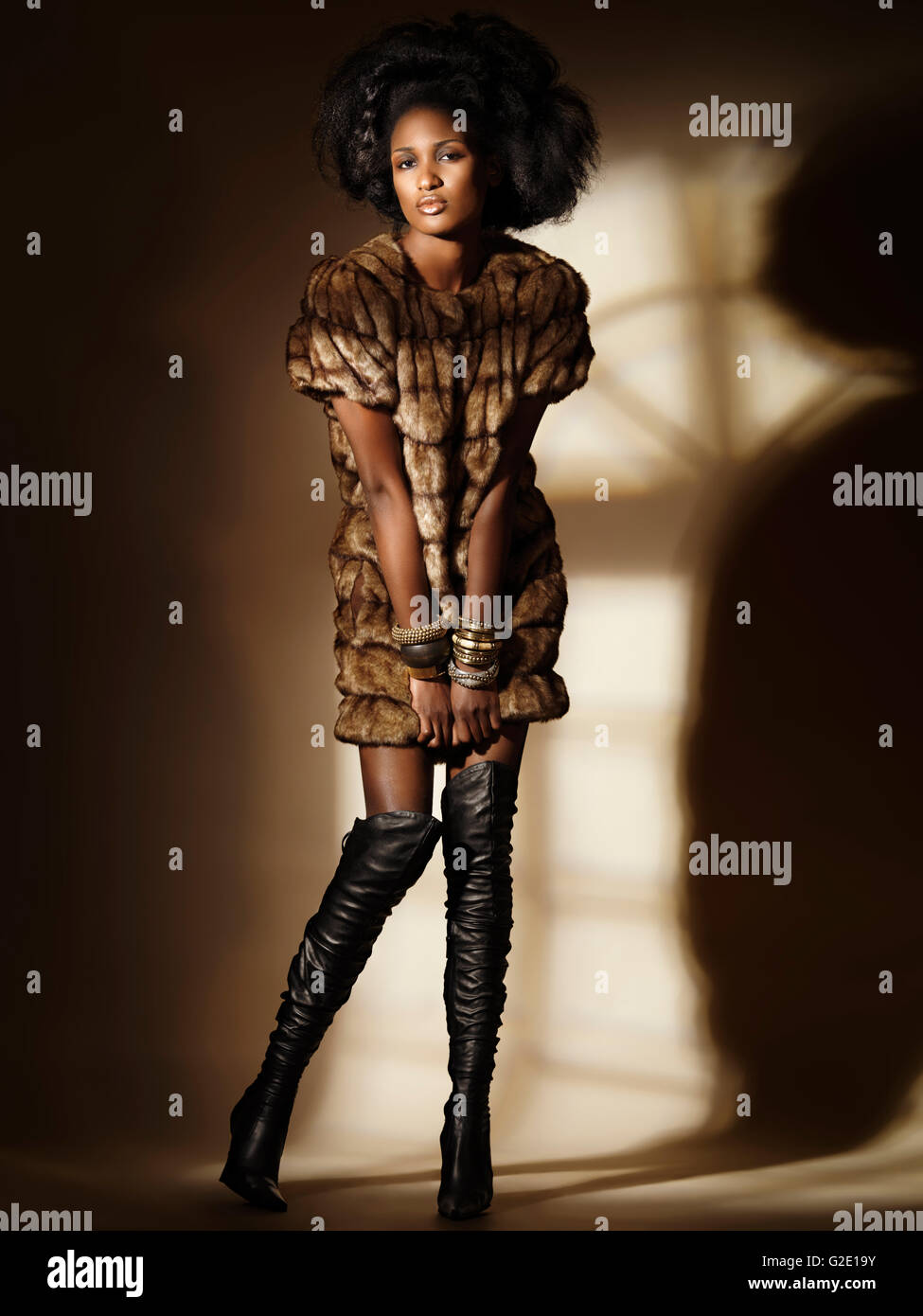 Wearing A Full Length Fur Coat High Resolution Stock Photography and ...