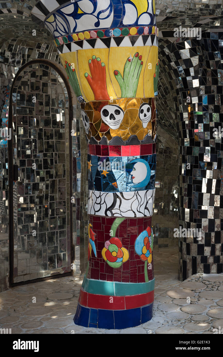 Colorful pillar at Giardino dei Tarocchi or Garden of the Tarot, by Niki de Saint Phalle and Jean Tinguely, in Capalbio Stock Photo