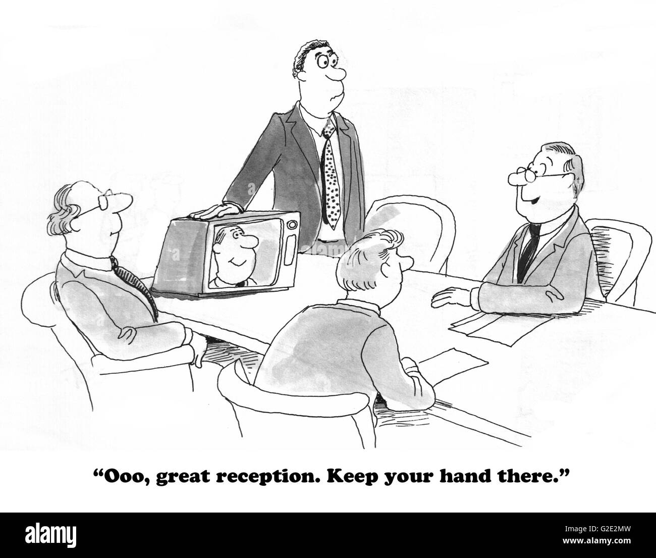Business cartoon about boss treating coworker as a flunky, asking him to hold his hand on monitor to maintain clear reception. Stock Photo