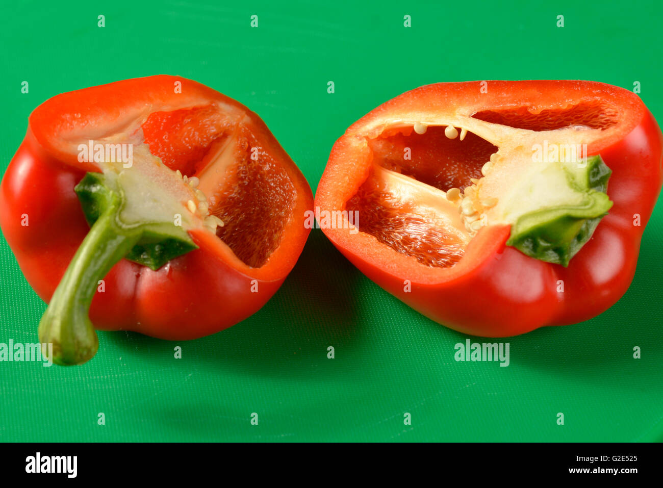 Red bell pepper on green chopping board - the correct colour board for ...