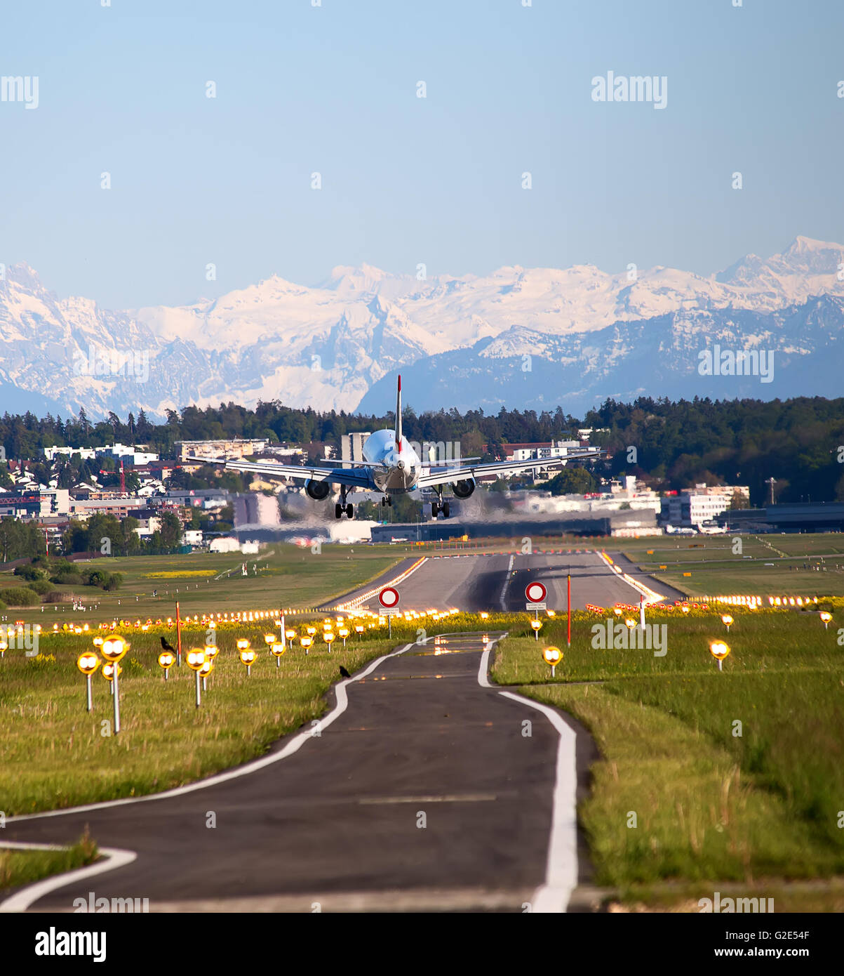 ZURICH - MAY 5: Austrian airlines A-320 landing in Zurich airport after short haul flight on May 5, 2016 in Zurich, Switzerland. Stock Photo