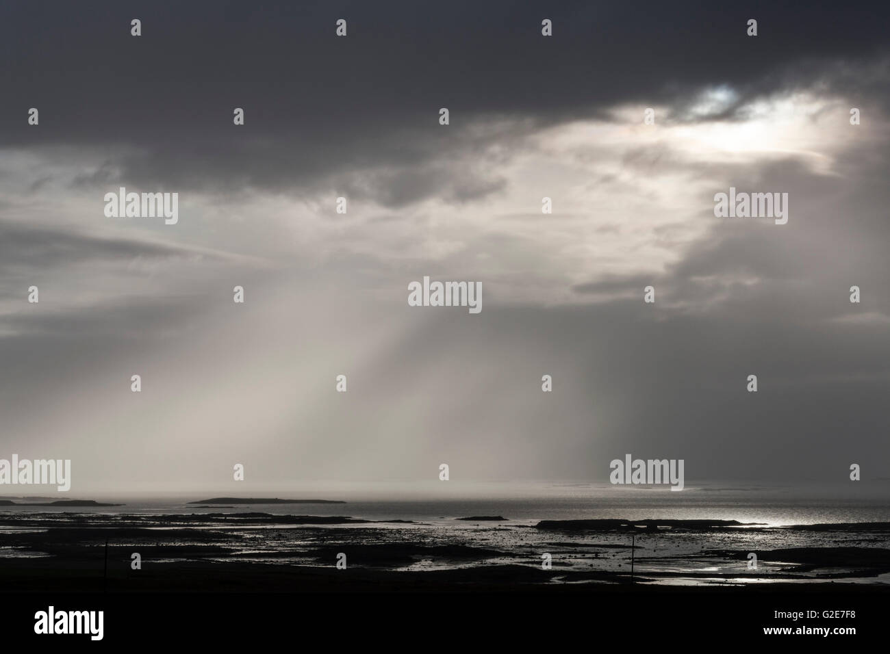 Dramatic Sky with Sun Rays Coming Through Clouds over Ocean Stock Photo ...