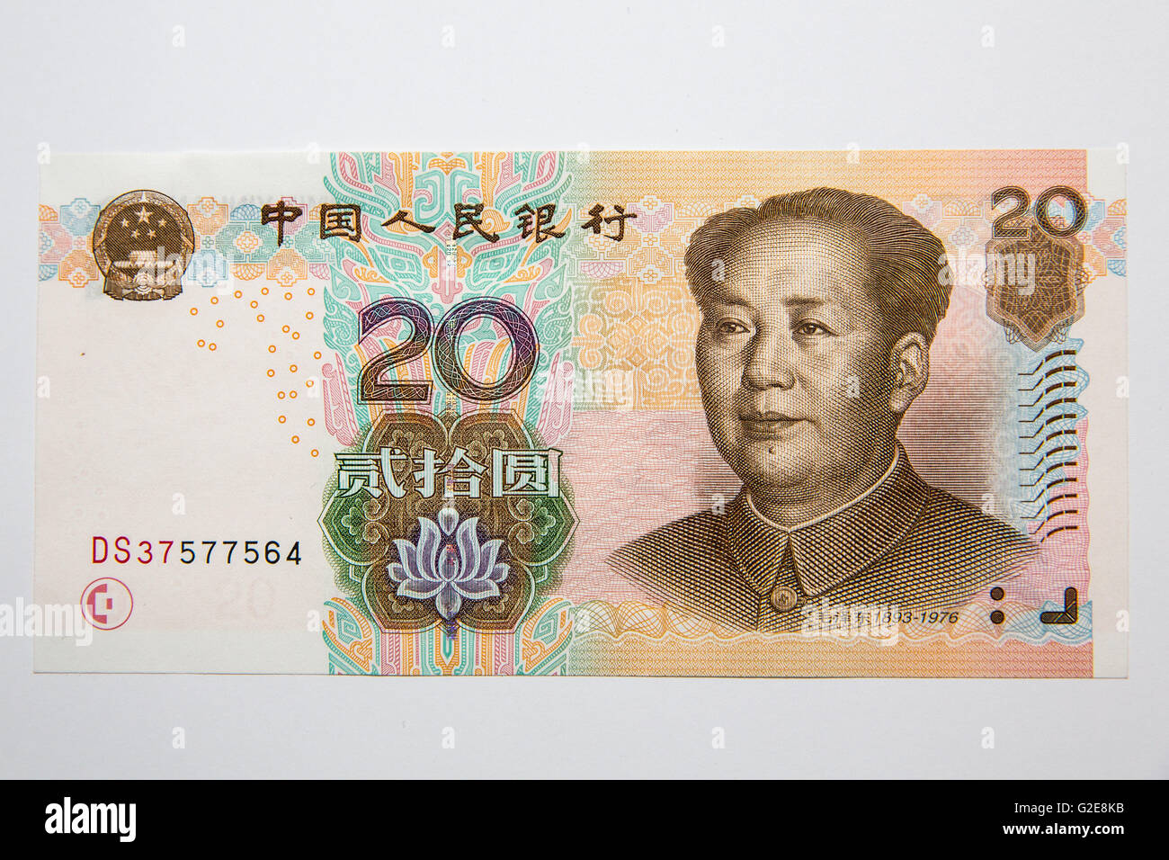 The front side of a Chinese 20 Yuan paper note lying on a table Stock Photo