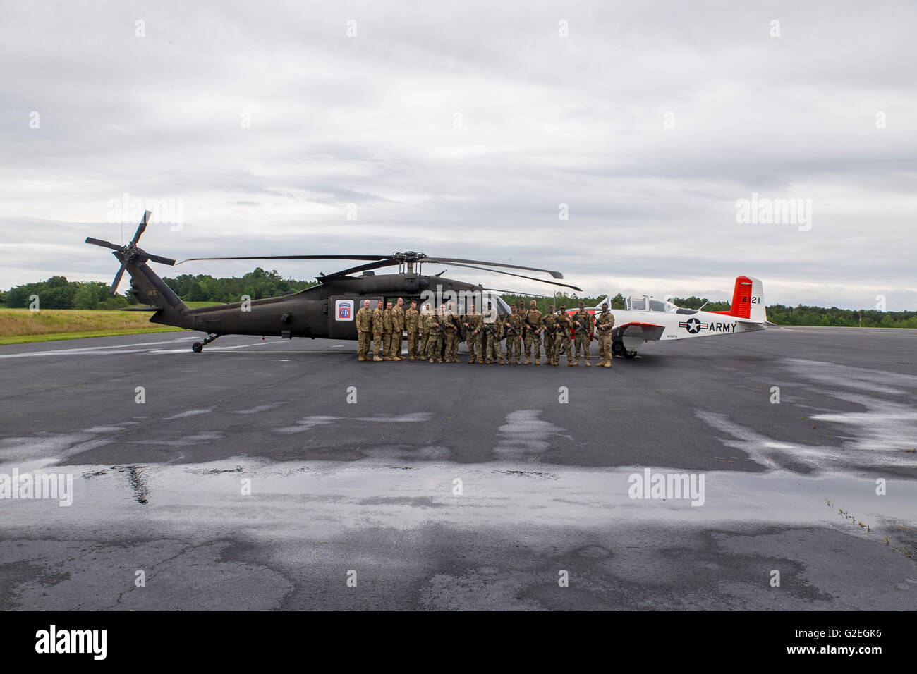 Concord, NC, USA. 29th May, 2016. Concord, NC - May 29, 2016: The 82nd Combat Aviation Brigade pose with their aircraft and some vintage airplanes before the Coca Cola 600 at the Charlotte Motor Speedway in Concord, NC. Credit:  csm/Alamy Live News Stock Photo