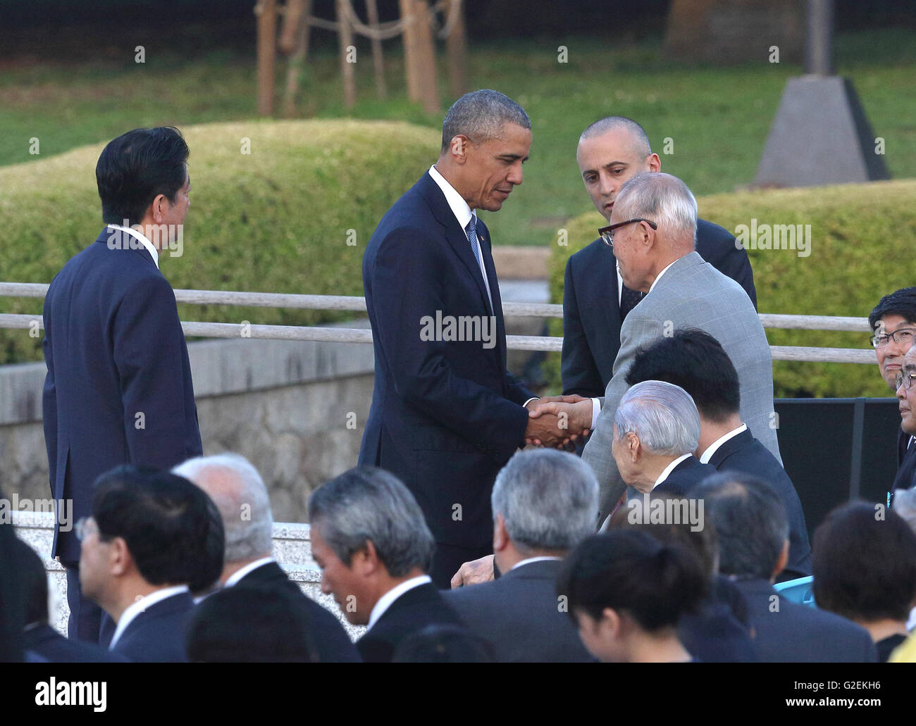 U.S. president Barack Obama talks with an atomic bomb survivor Shigeaki Mori at Hiroshima Peace Memorial Park in Hiroshima, Japan on May 27, 2016. © Motoo Naka/AFLO/Alamy Live News Stock Photo