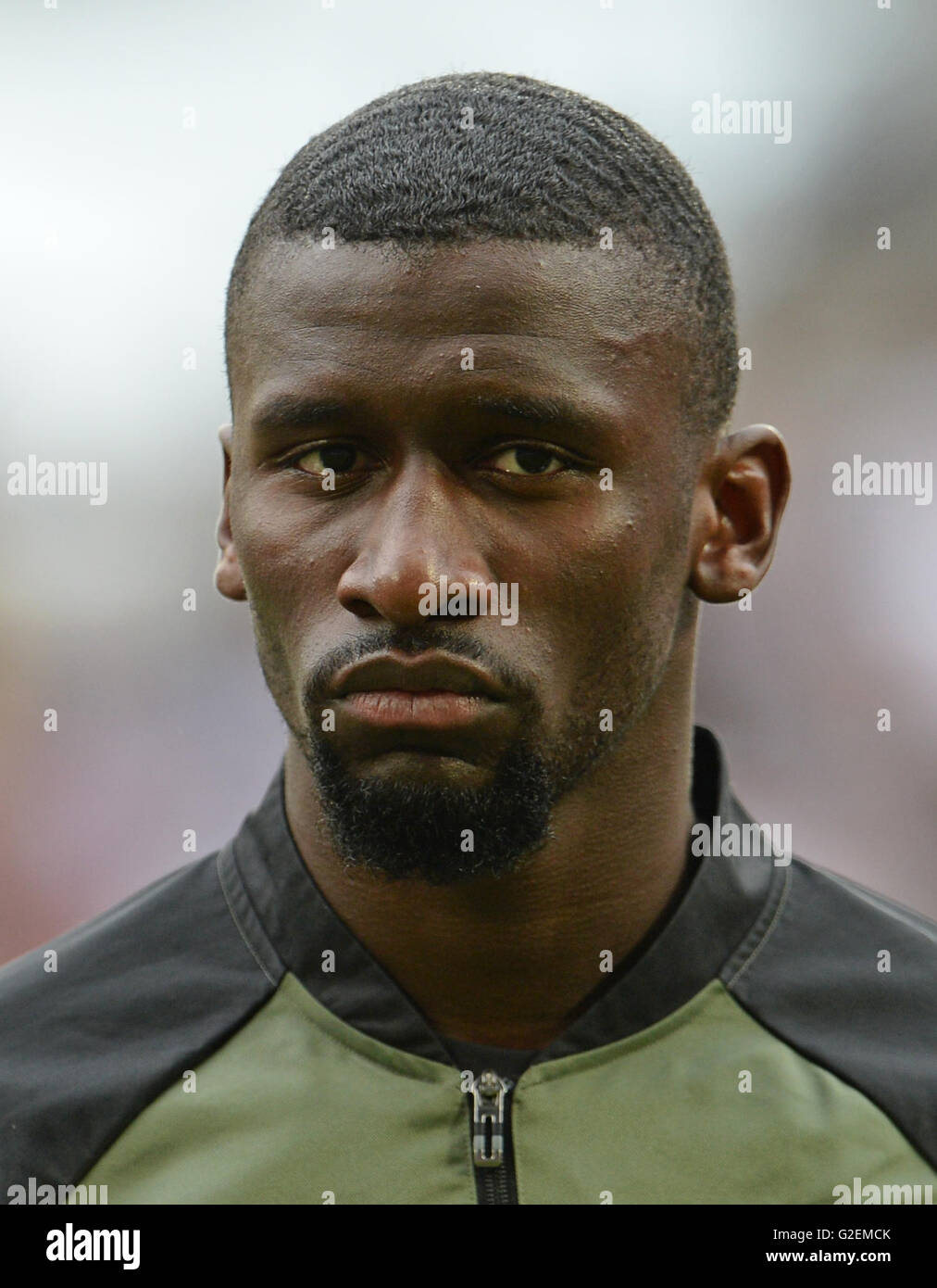 Augsburg, Germany. 29th May, 2016. Germany's Antonio Ruediger stands during the national anthem ahead of the international soccer match between German and Slovakia in the WWK Arena in Augsburg, Germany, 29 May 2016. Photo: ANDREAS GEBERT/dpa/Alamy Live News Stock Photo
