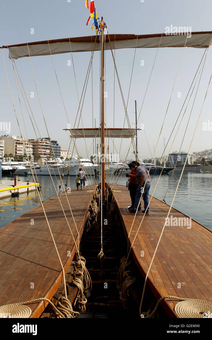 Piraeus, Greece. 30th May, 2016. The Hellenic Navy has launched trireme Olympias back to sea after a period of repairs. The crew consisted of 170 cadets from the Naval Academy and the Naval Academy of Non-Commissioned Officers. Trireme Olympias was first launched in May 1985 and handed over to the navy in July 1987. It has a length of 36.9m, beam of 5.5m, draft of 1.25m and 35t of displacement.Hellenic Navy's Athenian Trireme is a true copy of the formidable vessels of the antiquity. These vessels proved their capabilities during the epic Battle of Salamis in 29 September 480 BC, considere Stock Photo