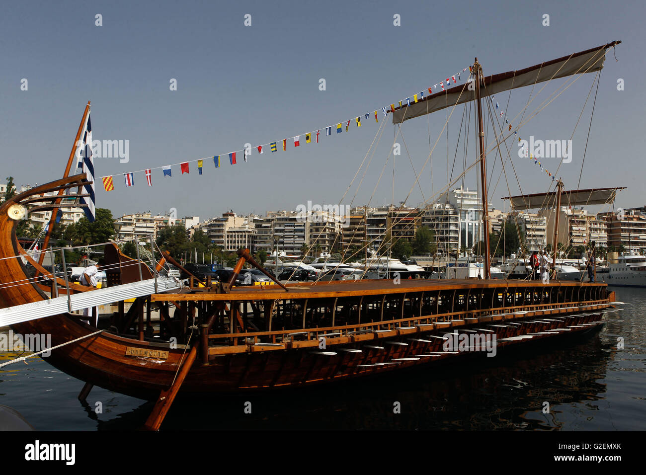 Piraeus, Greece. 30th May, 2016. The Hellenic Navy has launched trireme Olympias back to sea after a period of repairs. The crew consisted of 170 cadets from the Naval Academy and the Naval Academy of Non-Commissioned Officers. Trireme Olympias was first launched in May 1985 and handed over to the navy in July 1987. It has a length of 36.9m, beam of 5.5m, draft of 1.25m and 35t of displacement.Hellenic Navy's Athenian Trireme is a true copy of the formidable vessels of the antiquity. These vessels proved their capabilities during the epic Battle of Salamis in 29 September 480 BC, considere Stock Photo