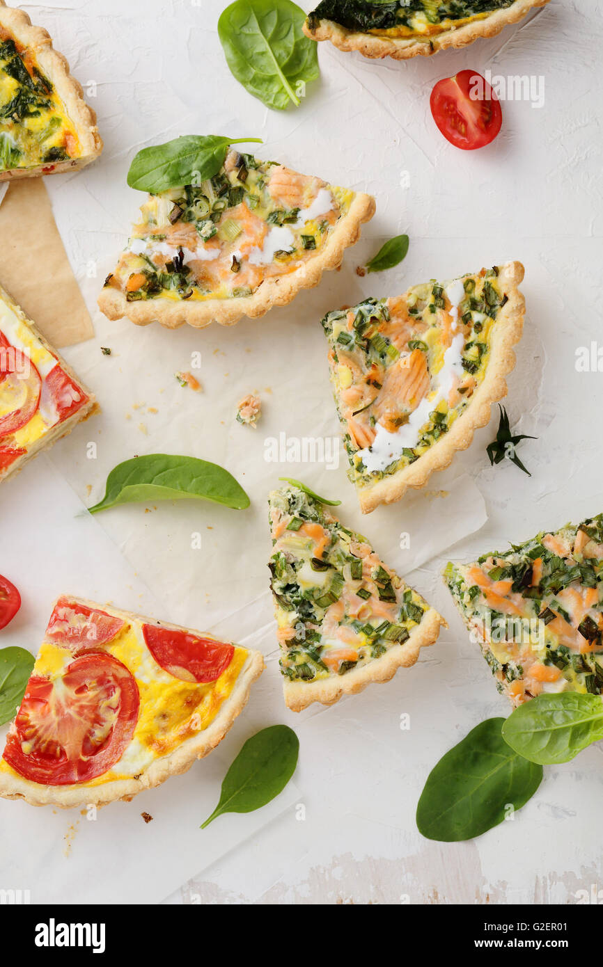 slices quiche with salmon and spinach, food Stock Photo
