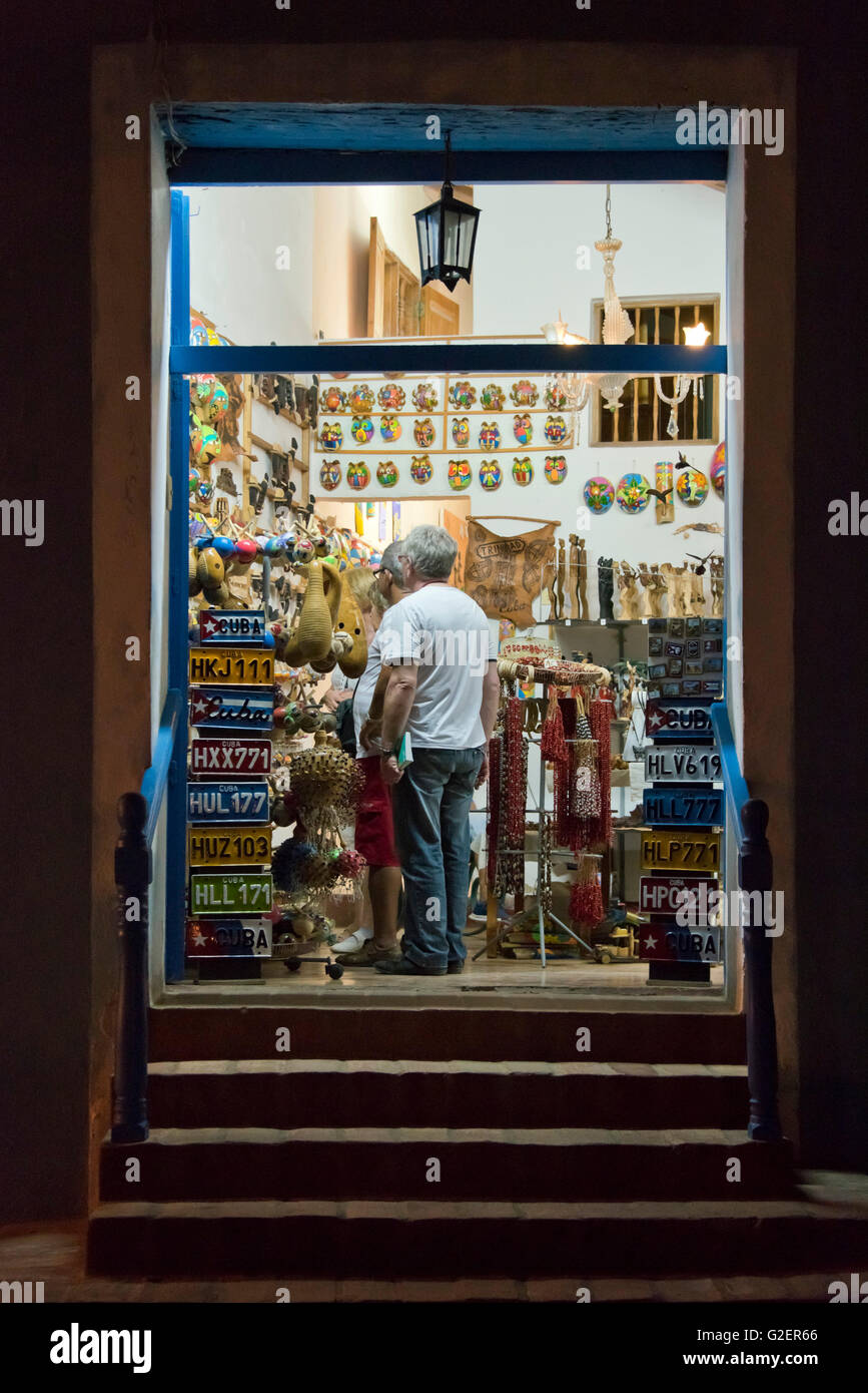 Vertical view of tourists looking in a souvenir shop in Trinidad, Cuba. Stock Photo