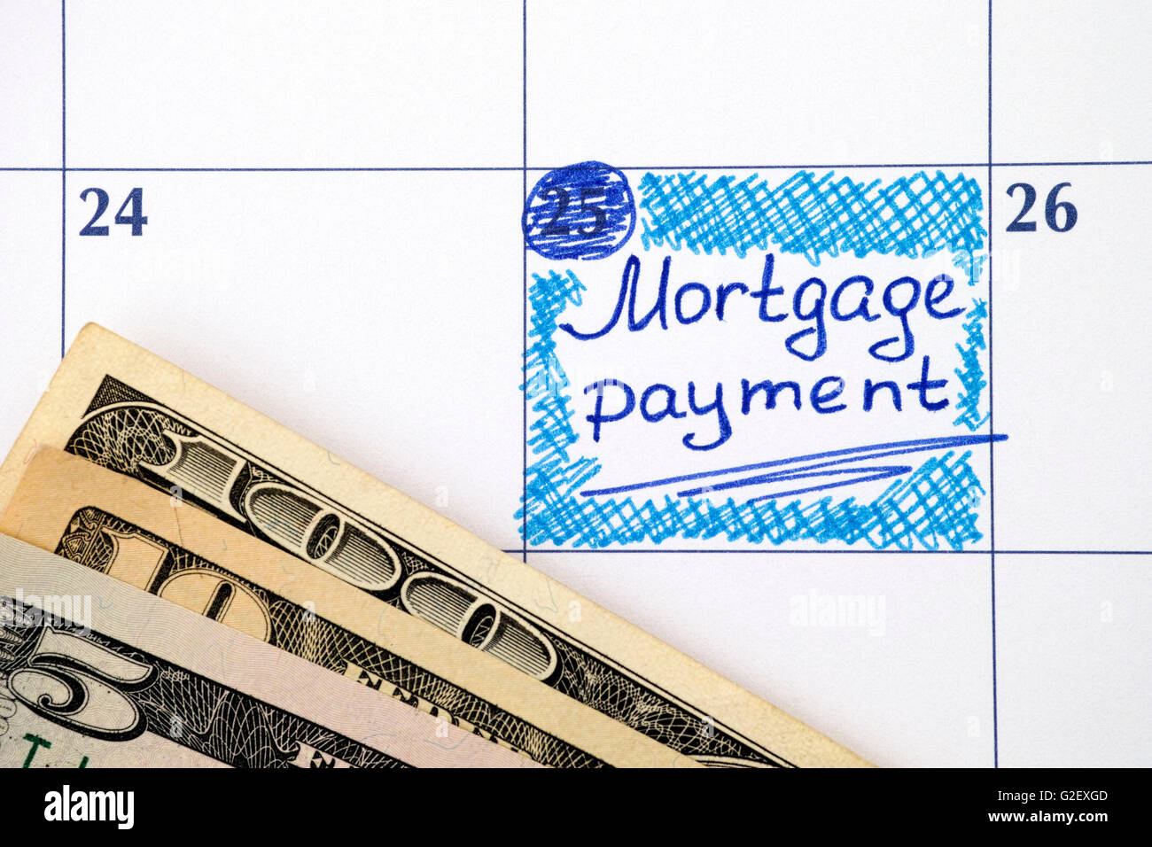 Reminder Mortgage Payment in calendar with money Stock Photo Alamy