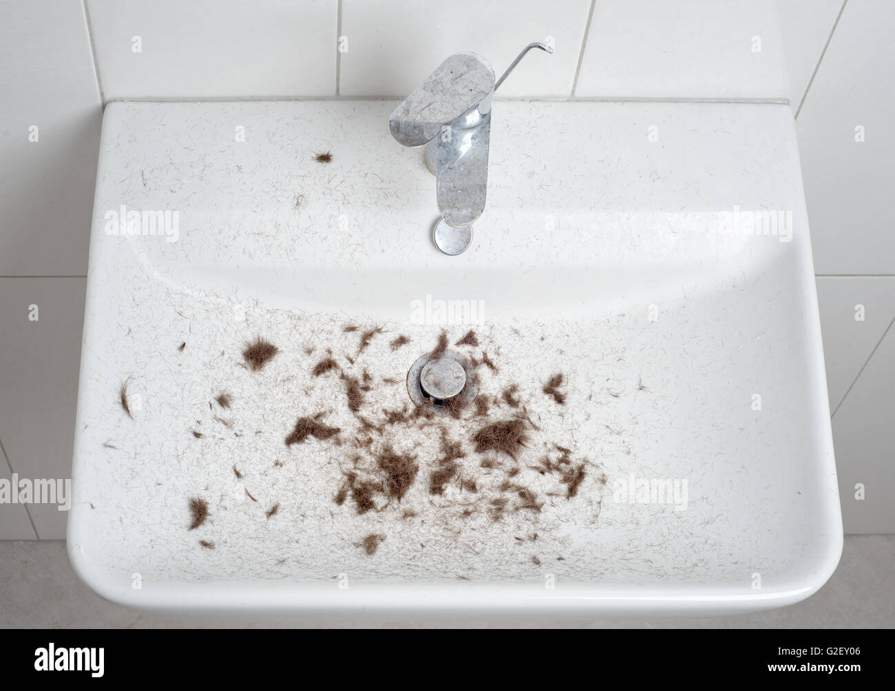 sink after hair cut with trimmer Stock Photo Alamy
