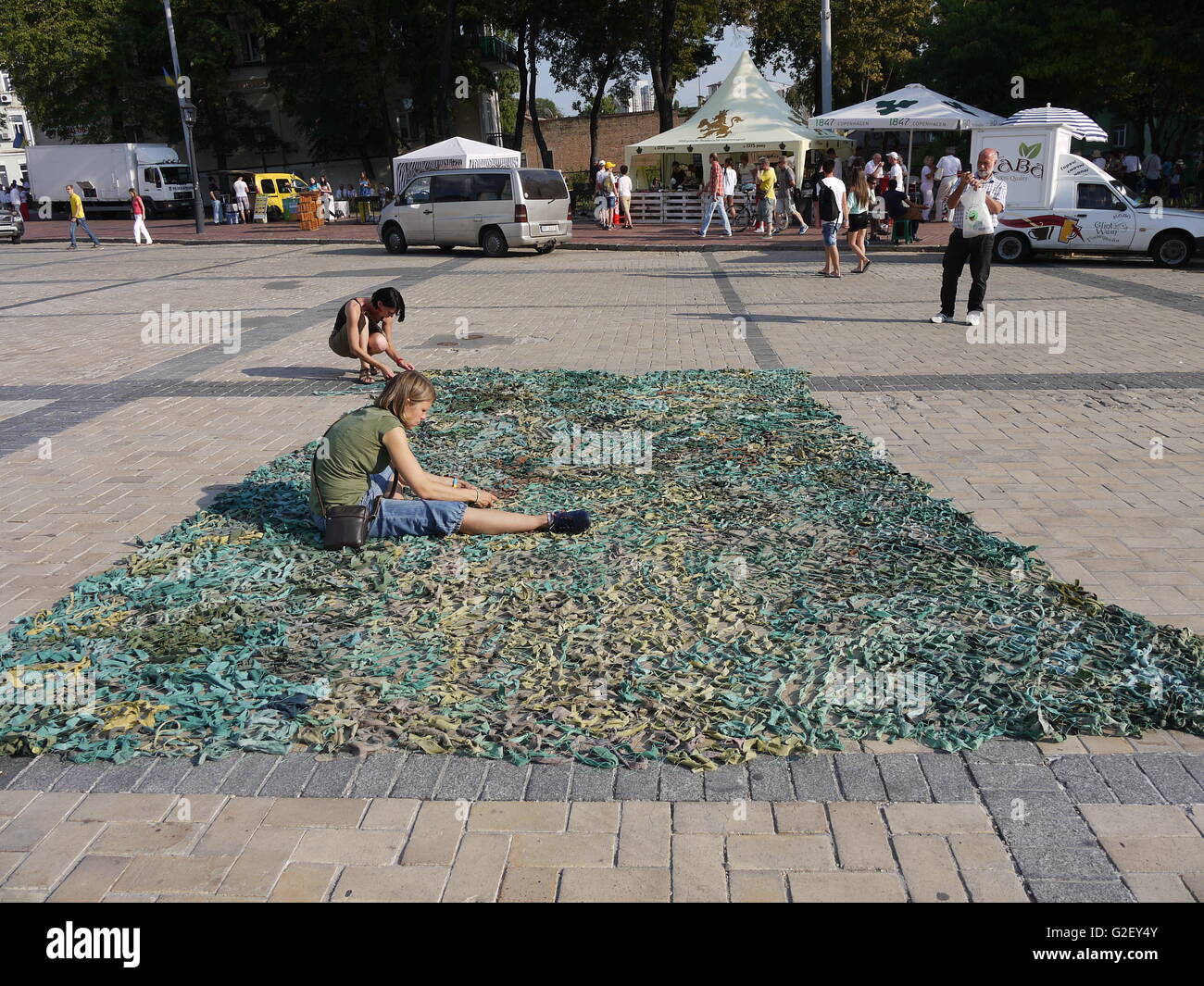 In Kiev, volunteers make camouflage nets to help Ukrainian army in Donbass Stock Photo