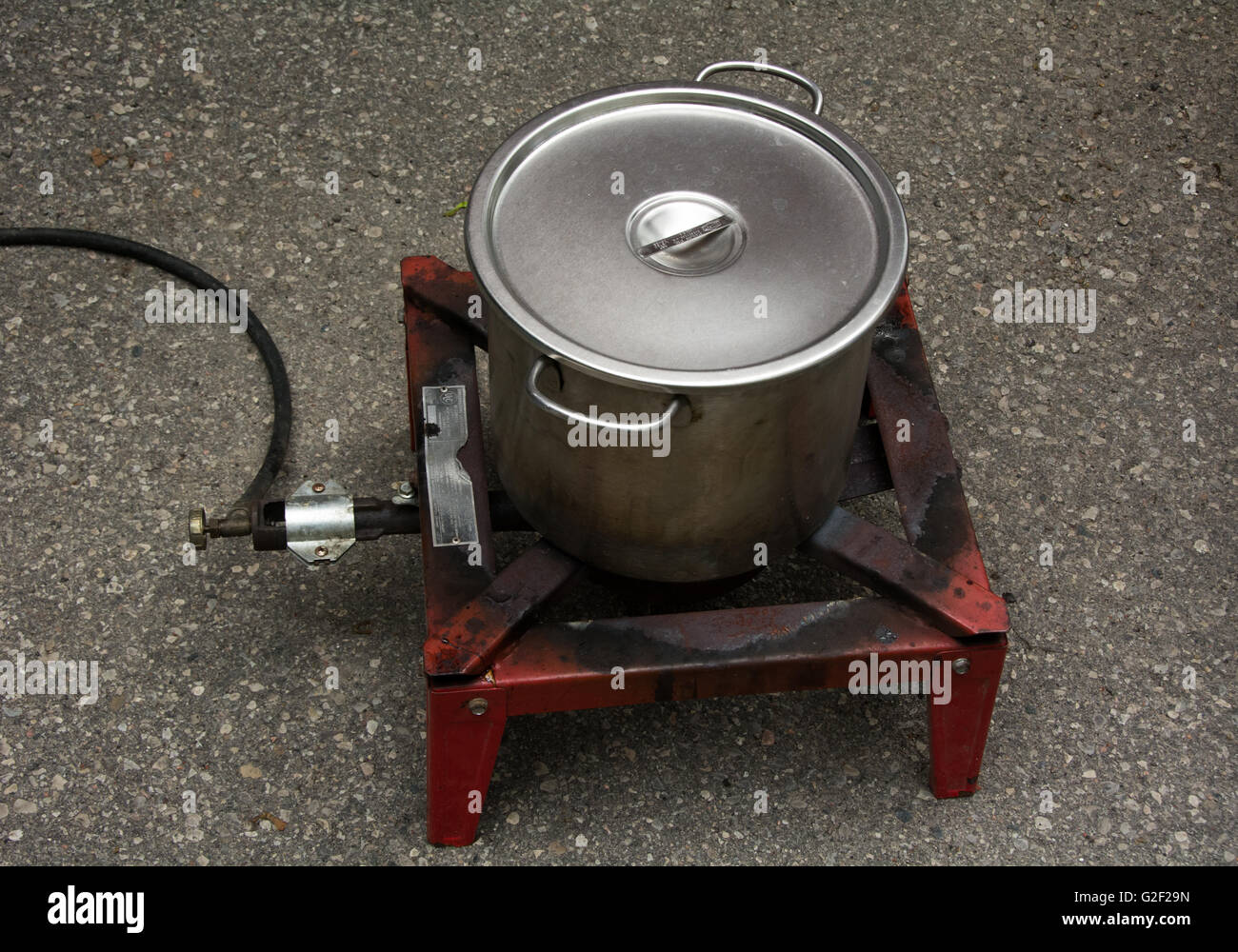 A pot on a propane burner used for boiling grains and extracts for a batch of home made beer Stock Photo