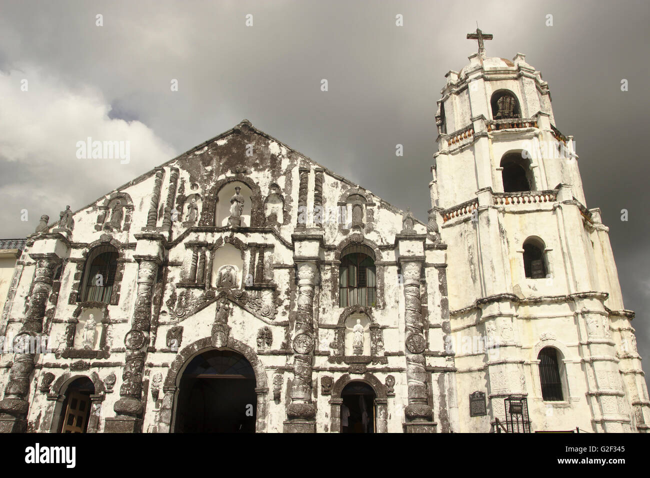 Daraga Church and dark clouds, near Legazpi, Albay Province, Bicol, Philippines Stock Photo