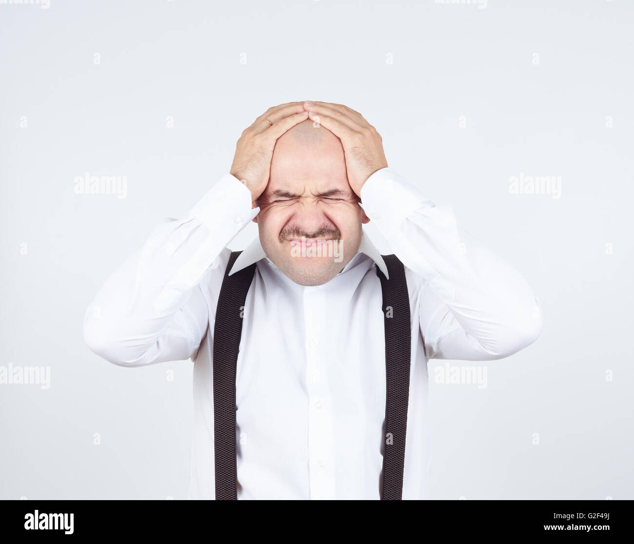 man holding his head pain. Closed eyes in pain. Headache. Migraine