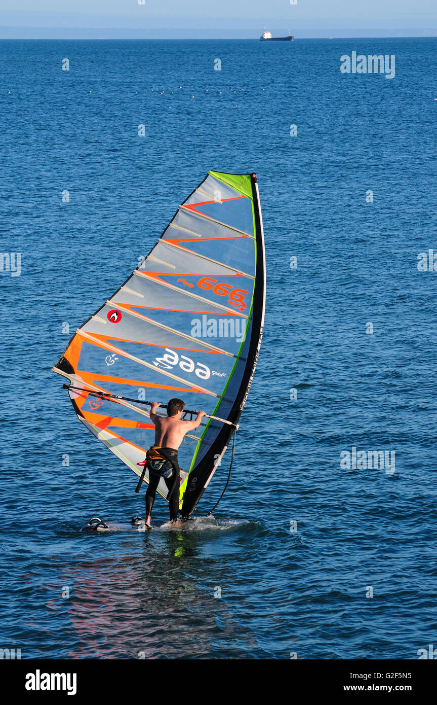 Surfer surfing in Estoril Cascais Portugal Stock Photo Alamy