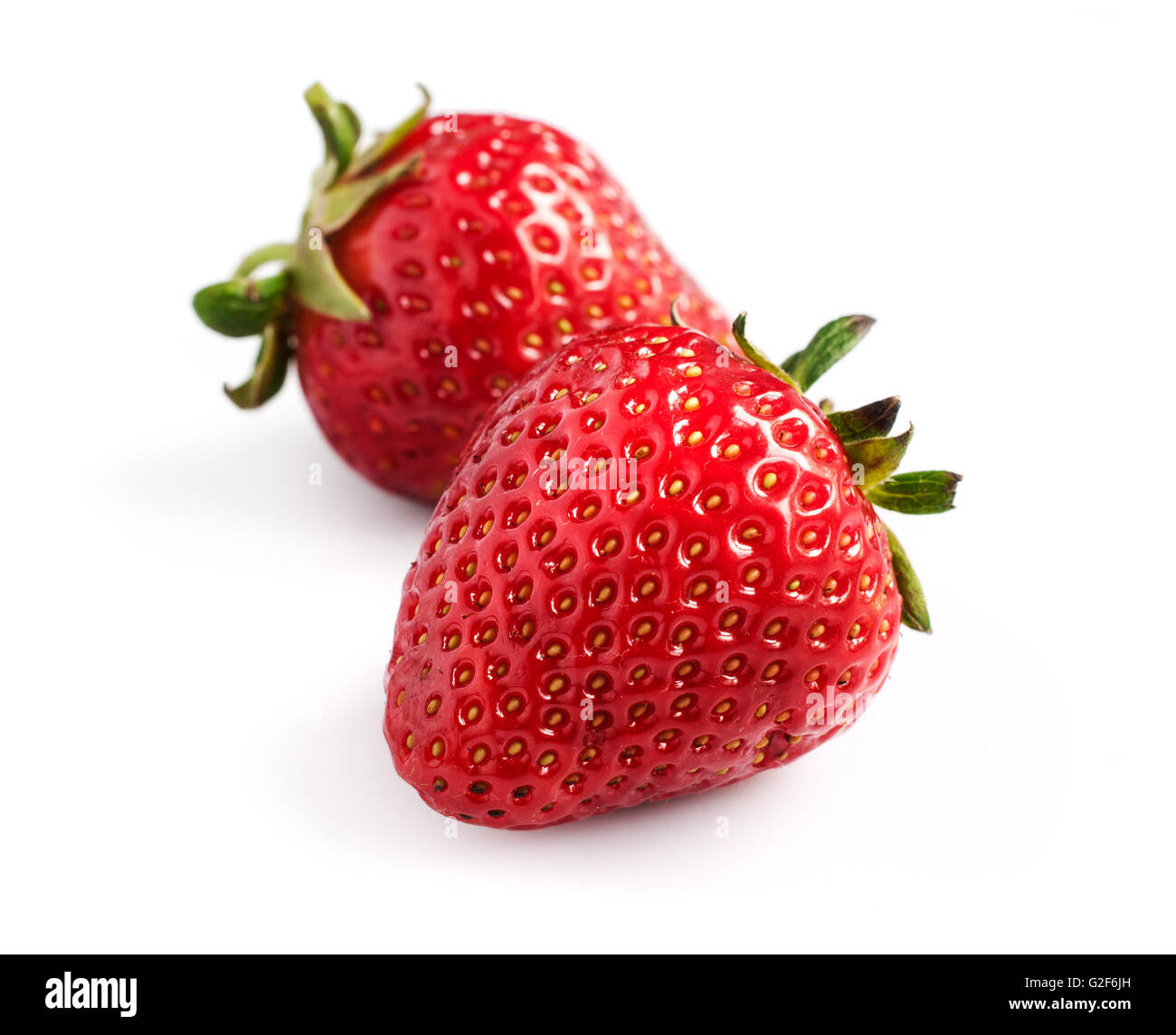Ripe strawberries isolated on white background Stock Photo - Alamy
