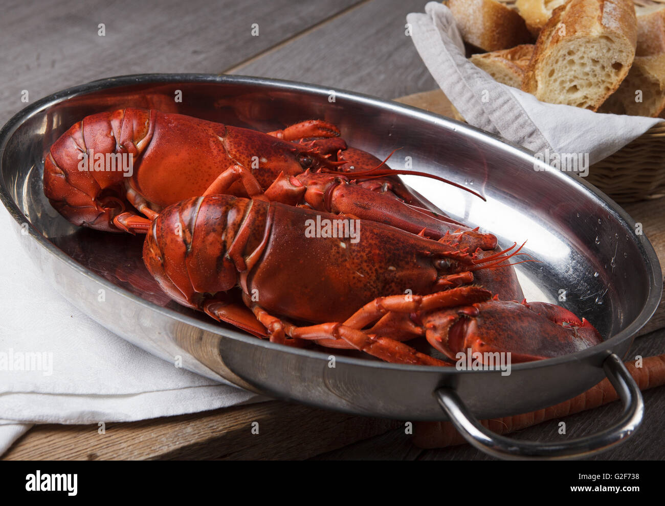 Freshly cooked lobsters served whole for dinner Stock Photo